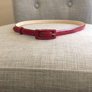 Red patent leather skinny belt